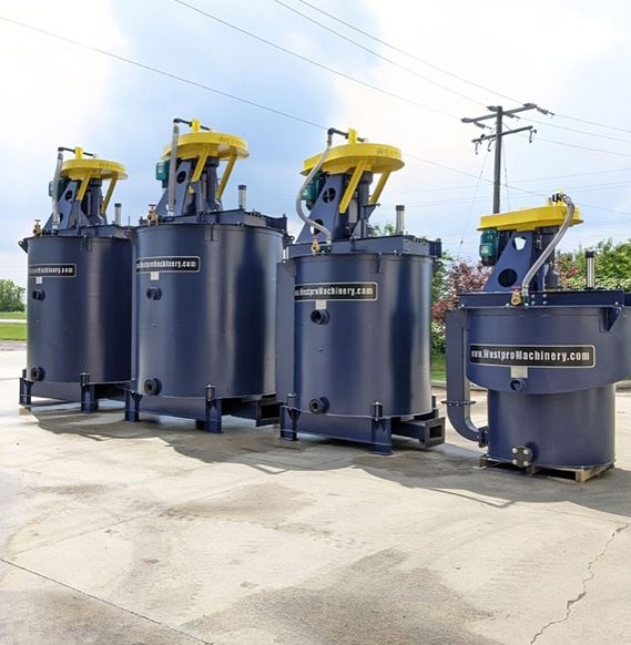 Sequentially arranged blue flotation tank units by size – used in the mining industry for flotation process