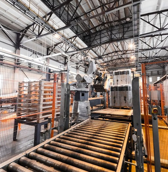 Heavy-duty automatic roller table in factory setting – supplied by leading roller table manufacturers